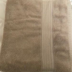 NEW Hotel collection luxury bath towel. Beige approximately 29x53 inches.